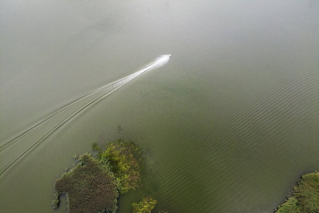 Water scooter on lake, summer landscape, aerial view. Water activitiesの写真素材