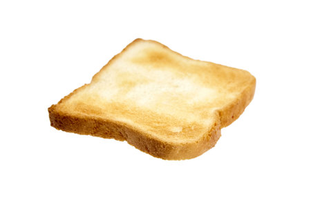 Fried toast bread slice isolated on white background. Toasted bread