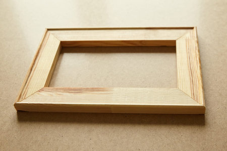Stretcher bar on table. Single wooden frame