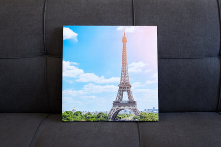 Photo canvas print stretched on frame with gallery wrap, photography with Eiffel Tower, photo printed on canvas on sofaの写真素材