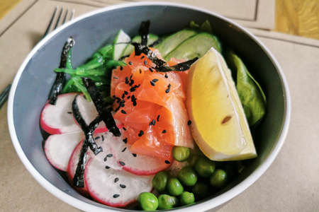 Poke bowl with salmon, healthy foodの写真素材