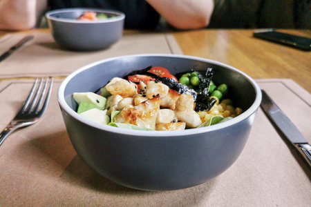 Poke bowl with chicken fillet and avocado, healthy food