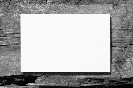White stretched canvas mockup on gray wooden wall