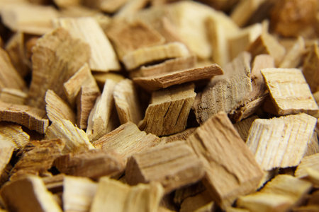 Wood chips for smocking texture background. Natural apricot wood smoking chunksの写真素材