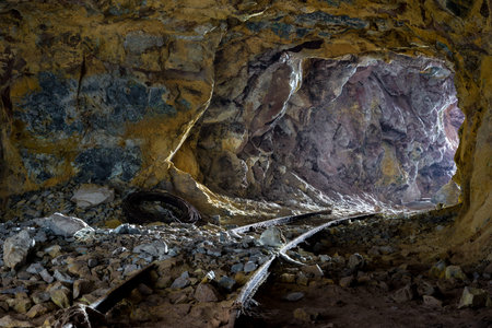 Walking towards the exit of the sulphur mine tunnel at the Greek island of Milos