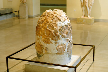 Delphi, Greece - April 17, 2009: The restored omphalos stone at the archaeological museum in Delphi, considered in antiquity to be the center of the world.のeditorial素材
