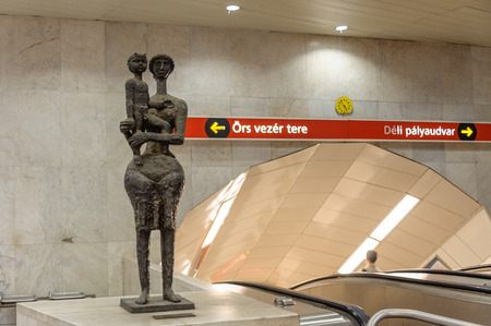 BUDAPEST, HUNGARY - JUNE 29, 2009: Mother and Child bronze sculpture by Joseph Somogyi at the Kossuth metro stationのeditorial素材