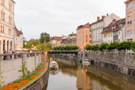 LJUBLJANA, SLOVENIA - JULY 9, 2009: Ljubljanica river and provisional wooden footbridge until the Grain Bridge is builtのeditorial素材