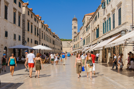 DUBROVNIK, CROATIA - SEPTEMBER 1, 2009: Stradun street and Franciscan monastery belfryのeditorial素材