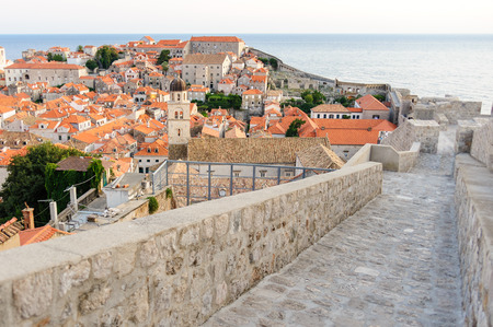 Ramparts on the west wall of Dubrovnik old city with a partial view of the cityの写真素材