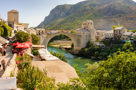 MOSTAR, BOSNIA AND HERZEGOVINA - SEPTEMBER 1, 2009: The new Stari Most (Old Bridge), Tara, Hercegusa and Halebija towersのeditorial素材