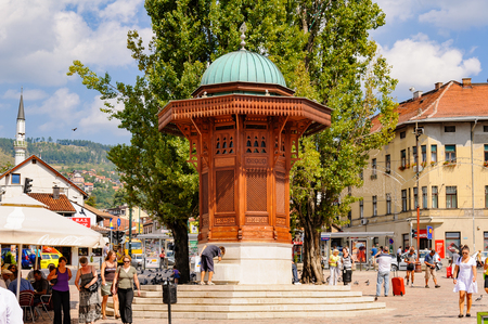 SARAJEVO, BOSNIA AND HERZEGOVINA - SEPTEMBER 4, 2009: The Sebilj wooden water fountain (Sebil) at Bascarsija squareのeditorial素材