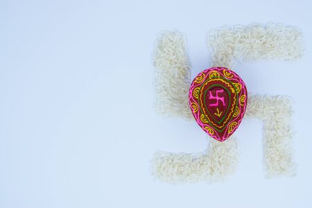 Indian festival Diwali, Diya oil lamps lit on colorful rangoli. Hindu traditional. Happy Deepavali.の写真素材