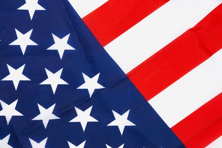 US American flag on white background. For USA Memorial day,  Memorial day, Presidents day, Veterans day, Labor day, Independence day, or 4th of July celebration. Top view, copy space for text.の写真素材