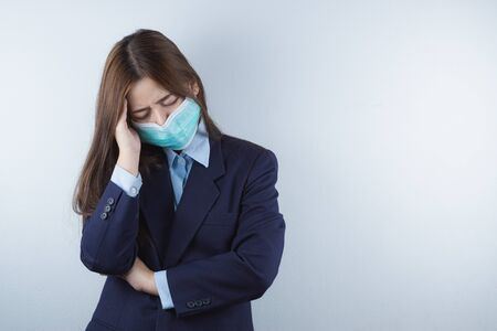 The business woman coughing flu from coronavirus and pm 2.5. Coronavirus and Air pollution pm 2.5 concept.の写真素材