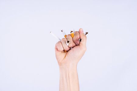 Man refusing cigarette concept for quitting smoking. No smoking campaign concept.の写真素材