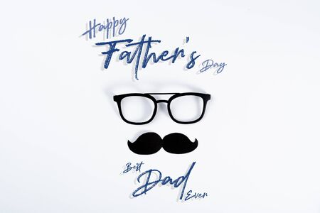 Happy Father Day background concept with glasses and black mustache on white background with copy space for text.の写真素材