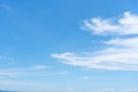 Clear blue sky with white cloud background in the morning. Good weather background.の写真素材