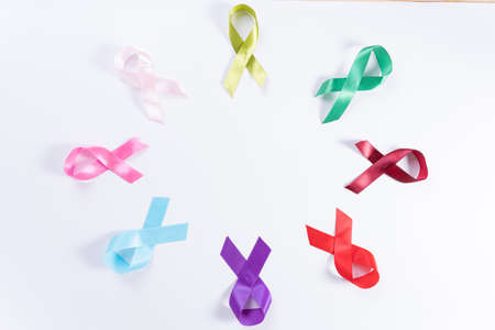 World cancer day, colorful ribbon cancer awareness on with background with copy space for text. Healthcare and medical concept.の写真素材