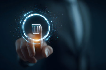 A finger touches a digital delete icon inside a glowing circle.の素材