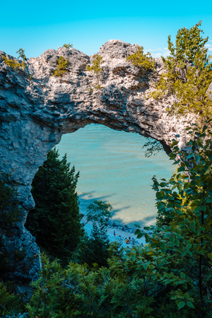 Portrait view of Arch Rock looking out over Lake Huron on Mackinac Islandの写真素材