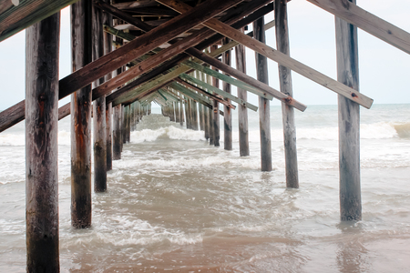 The Pier at Ocean Isle Beach North Carolina during high tideの写真素材
