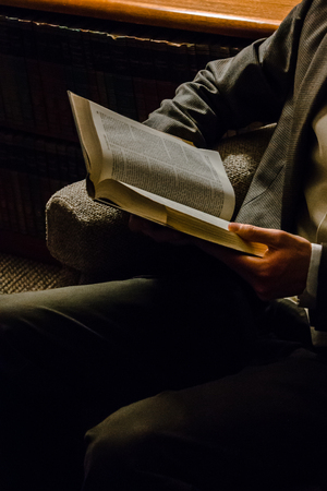 Man reading a bookの写真素材