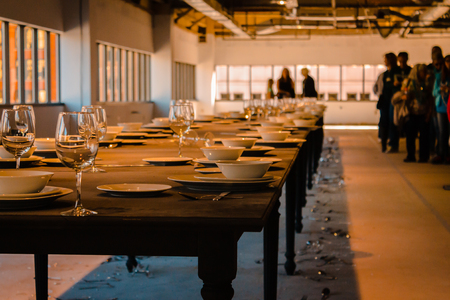 Art entry where whispers vibrate a table and break the place settingsの写真素材