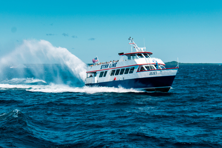 Star Line boat ferrying tourists across Lake Michigan to Mackinac Islandのeditorial素材