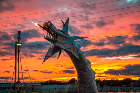 Dragon sculpture breathing fire at sunset at Artprize 9のeditorial素材