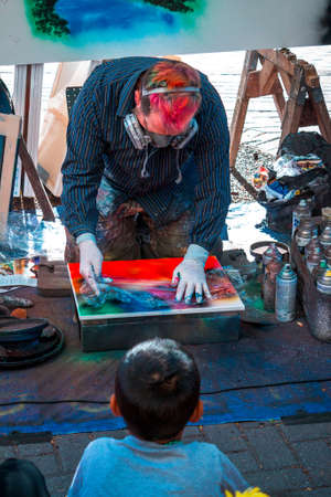 Spray paint artist showing off his craft at Artprize 9のeditorial素材