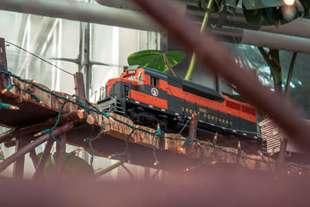 Model train running across a bridgeのeditorial素材