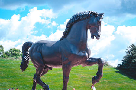 Kids playing at the American Horse statue in the Frederik Meijer Gardensのeditorial素材