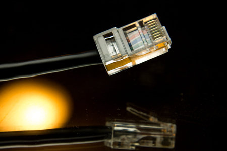 Artistic shot of an  cable and its reflection