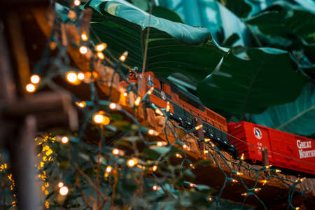 Locomotive train on a bridge in a holiday model train displayのeditorial素材