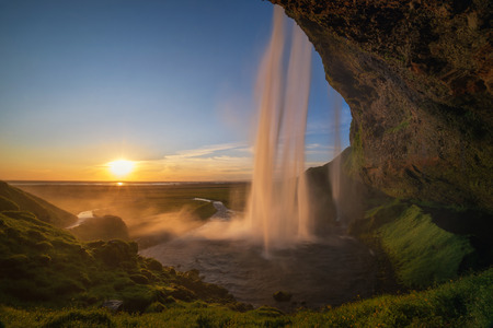 Seljlandsfoss  waterfall sunset in Icelandの写真素材