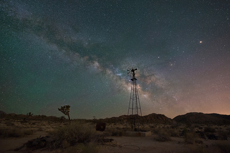 Old Windmill under the night skyの写真素材