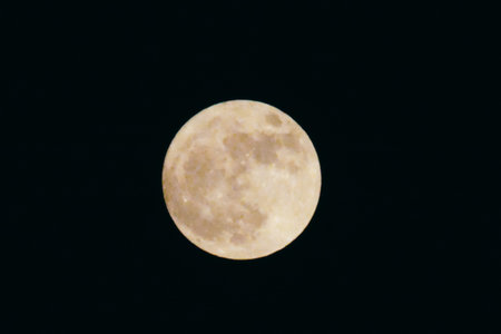 Full moon on black background. Close-up of the moon.