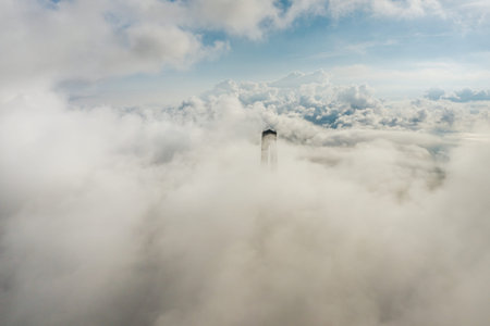 Aerial view of the top of the pylons of the Russian bridge in cloudsの写真素材