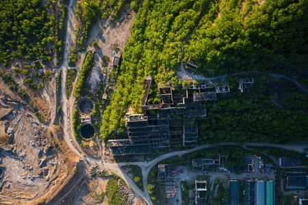 A drone view vertically down of the abandoned building of the mining plantの写真素材
