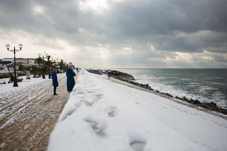 Immeretinskaya Embankment of Sochi after a winter snowfallのeditorial素材