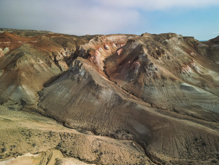 Aerial view over the sculpted hills and ravines of Aktumsuk, Karakalpakstan
