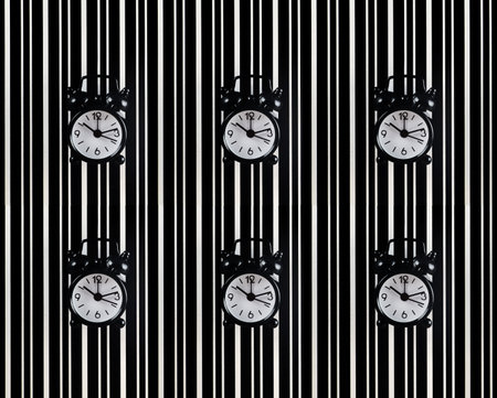 The symbol of the time is the alarm clock on the background of the diffraction bands.Black alarm...