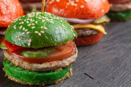 burgers with cutlet, cheese and fresh vegetables
