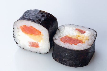 traditional Japanese cuisine. japanese sushi isolated on white background. maki sushi with salmon, avocado, soft cheese (Philadelphia)の写真素材