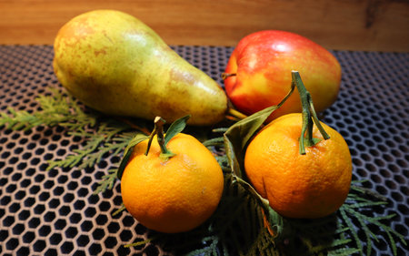 <p>tangerines and pear apple</p>の写真素材