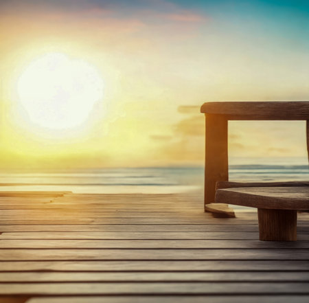 Wooden bench on the beach with sunset background, vintage tone. created with the help of artificial intelligence technologiesの素材
