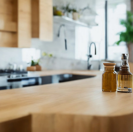 Bottle of olive oil on wooden table in modern kitchen, selective focus created with the help of artificial intelligence technologiesの素材
