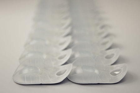 disposable lenses, packaged, on a white background