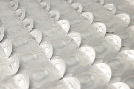 disposable lenses, packaged, on a white backgroundの写真素材